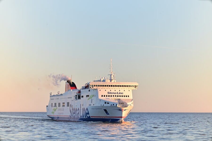 A passenger ferry sailing in the Baltic Sea at sunset