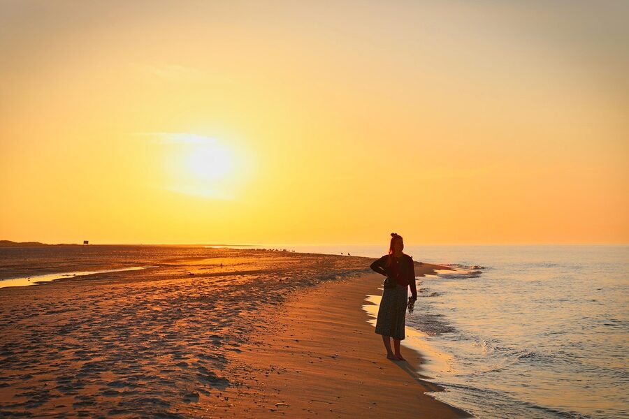 Skagen coast at evening light with a calm sea