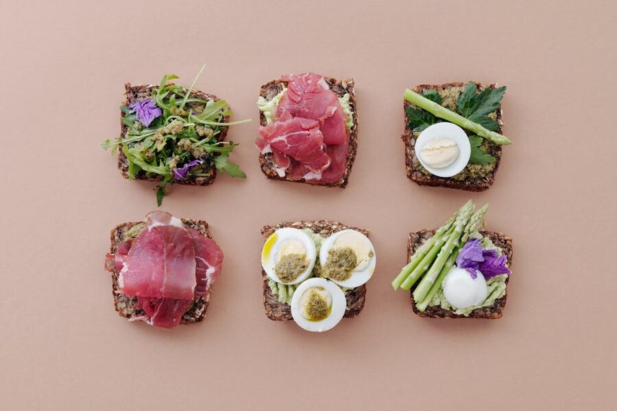 A flat-lay of several smørrebrød pieces on a Copenhagen lunch table