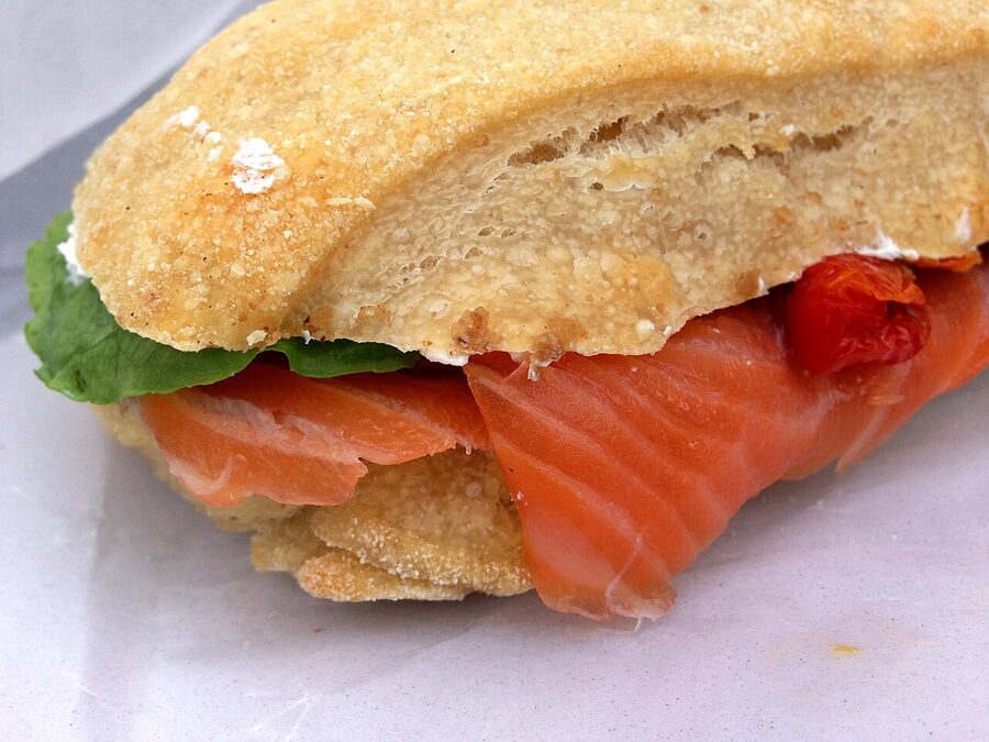 Open-faced sandwich with cold-smoked salmon, dill and lemon on rugbrød