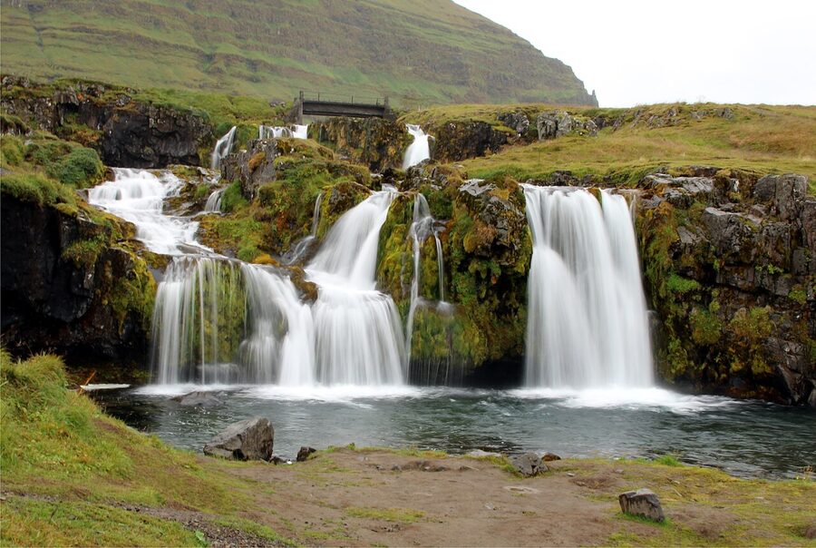 Kirkjufellsfoss waterfall and Kirkjufell mountain