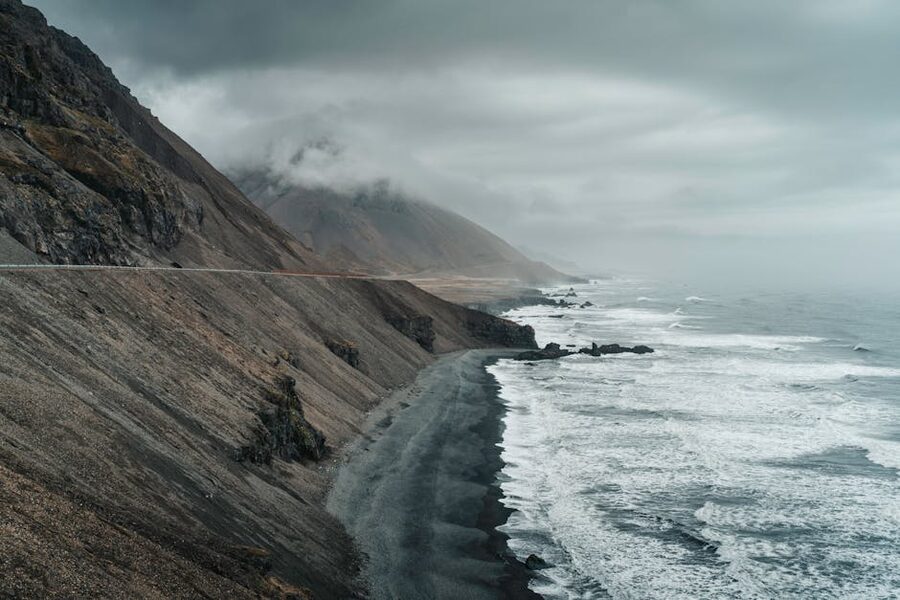 Iceland coast with dark sand beaches and waves