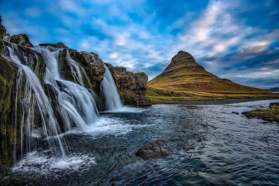 Kirkjufellsfoss waterfall with Kirkjufell mountain behind, classic Snæfellsnes view