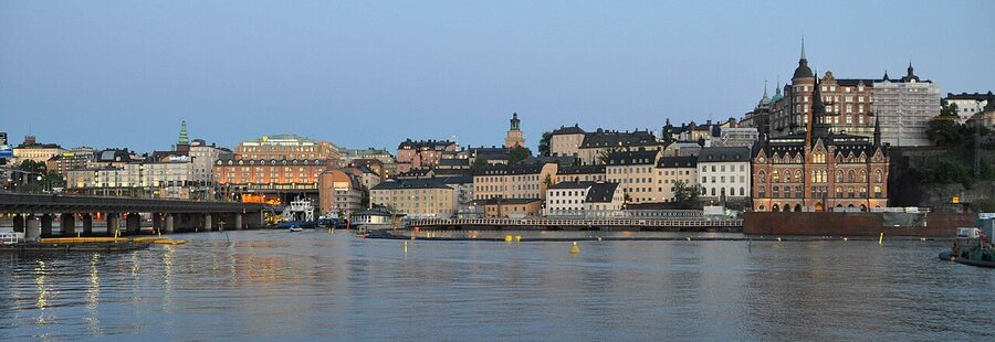 Söder Mälarstrand looking east toward Slussen, with the apartment cliffs above