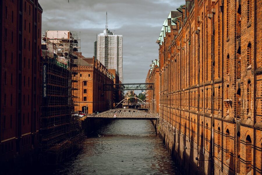 Red brick warehouses and a quiet canal in Hamburg's Speicherstadt district