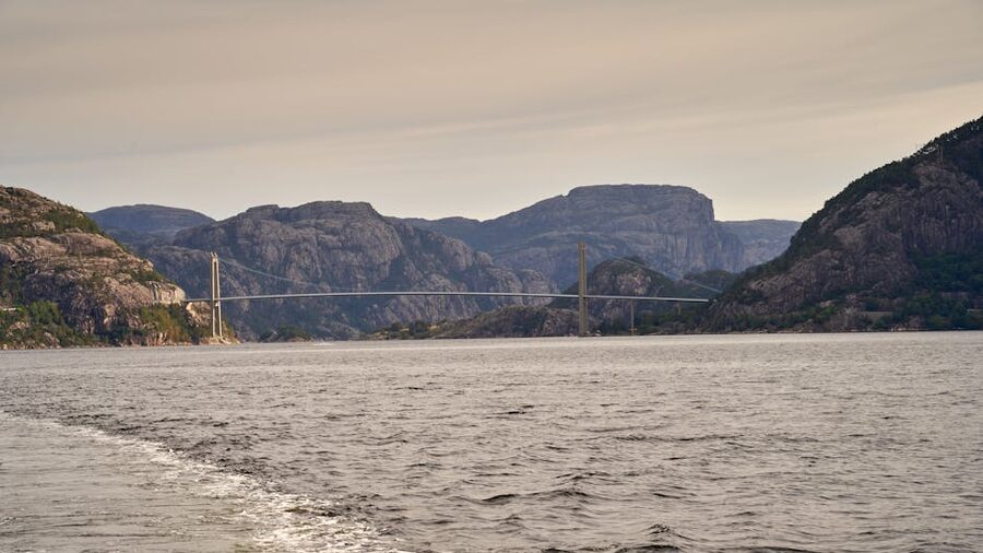 Lysefjord seen from the water with bridge and mountains