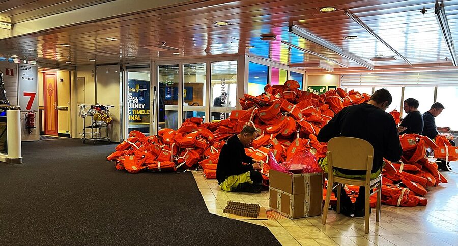 Lifejacket maintenance on the deck of MS Gabriella