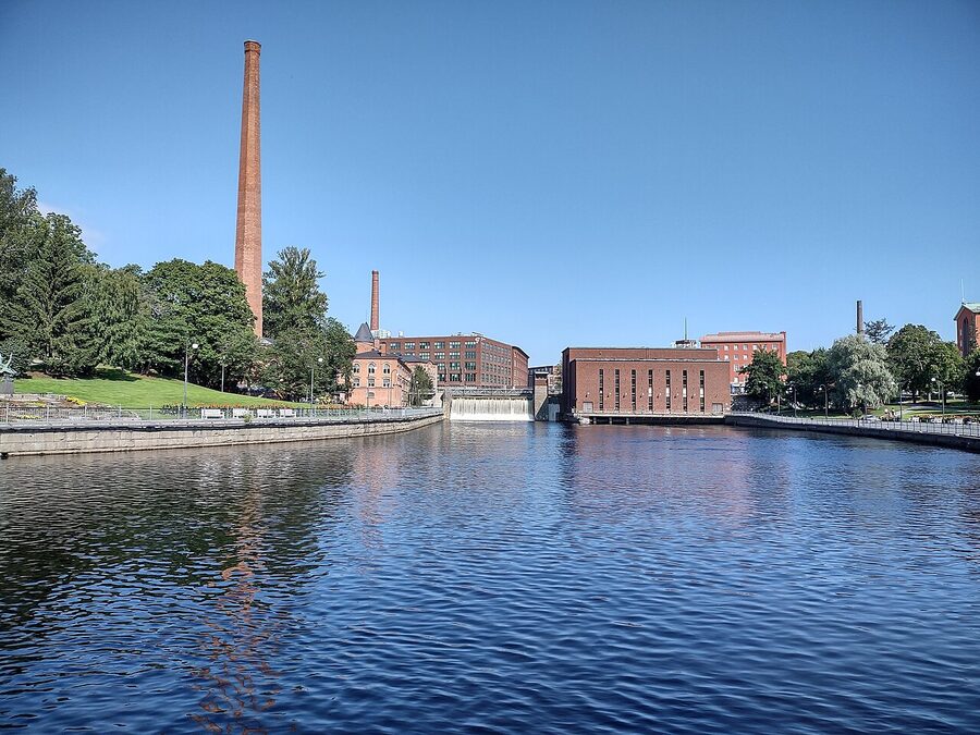 The Tammerkoski rapid in summer with the brick mill buildings on the banks