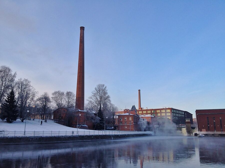 The Tammerkoski rapid in winter with foaming water and frost