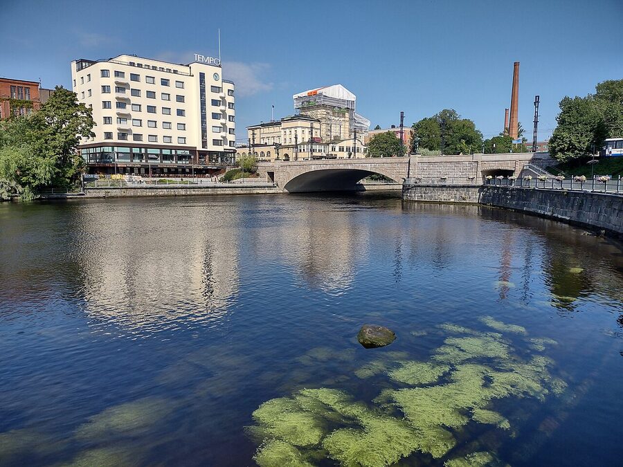 Hämeensilta bridge over the Tammerkoski with brick mill buildings on either side