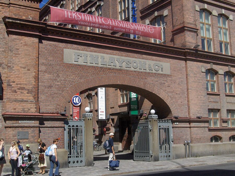The arched gate into the Finlayson factory complex