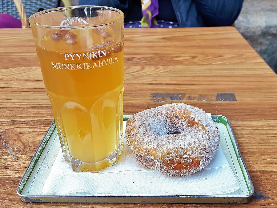 The wooden Pyynikin Munkkikahvila doughnut café at the foot of the observation tower