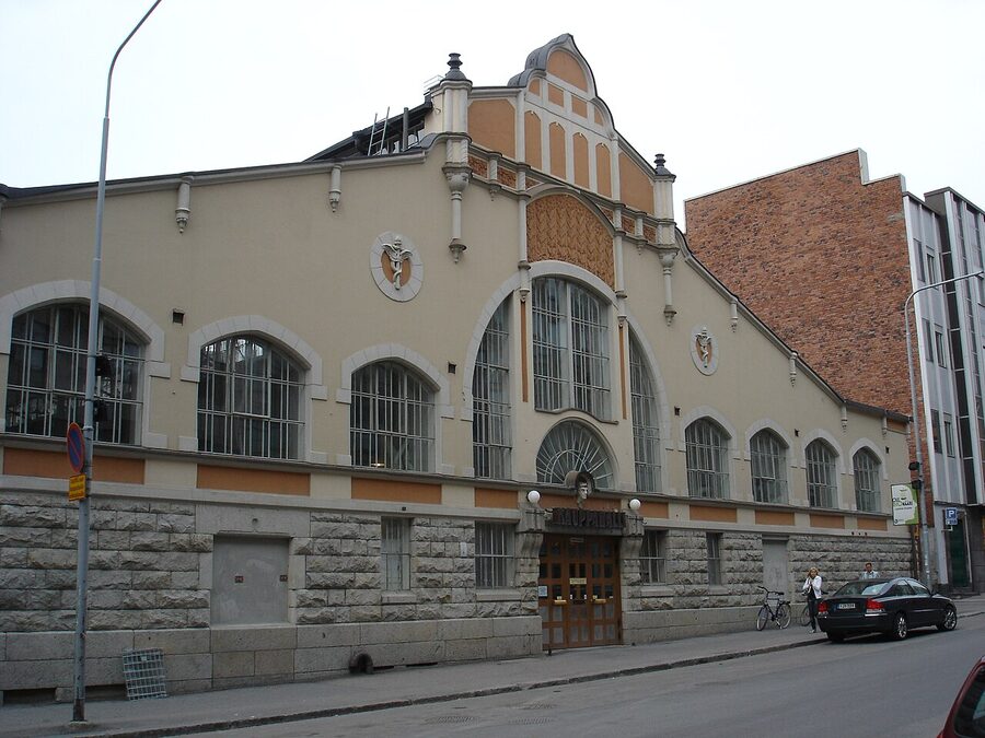 Inside the Tampere Kauppahalli with stalls and shoppers