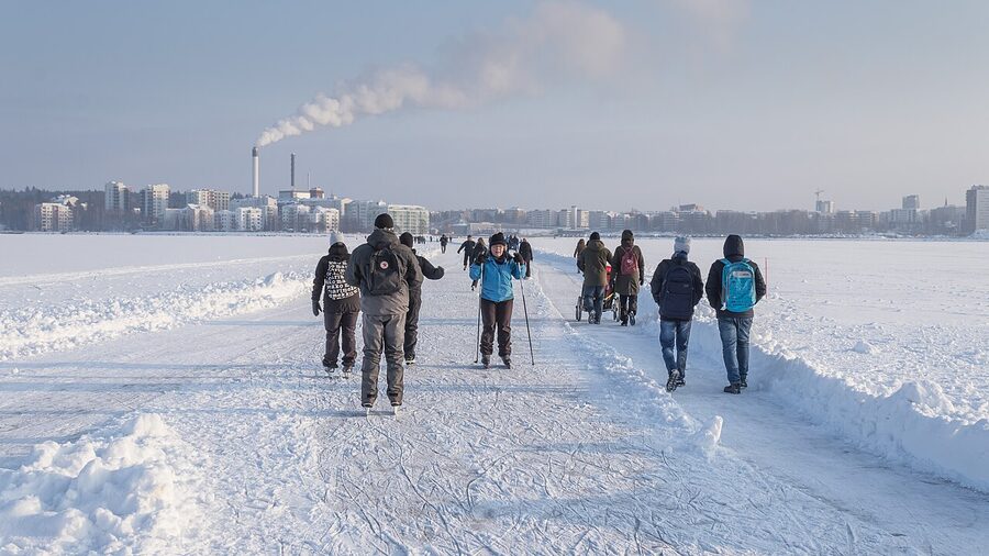 A Tampere downtown street in spring with people walking