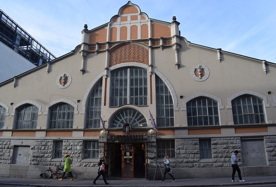 Inside the Tampereen Kauppahalli with bakery and butcher stalls