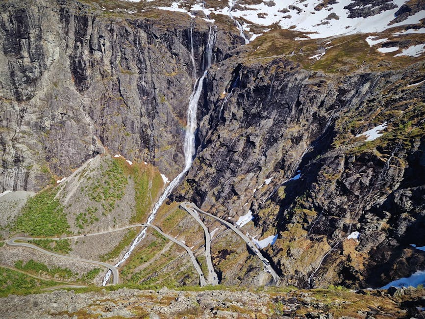 Aerial of Trollstigen pass and canyon waterfall