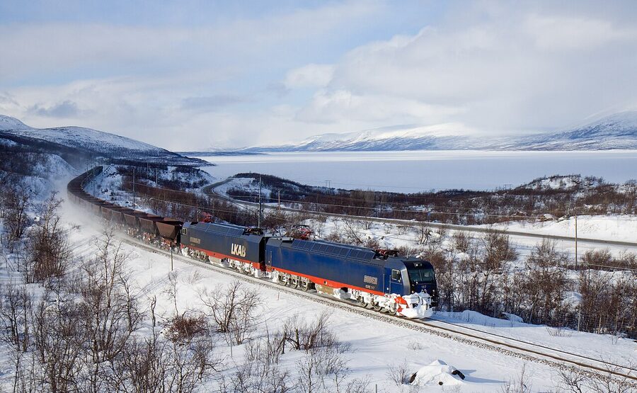 IORE iron-ore train passing Lake Tornetrask
