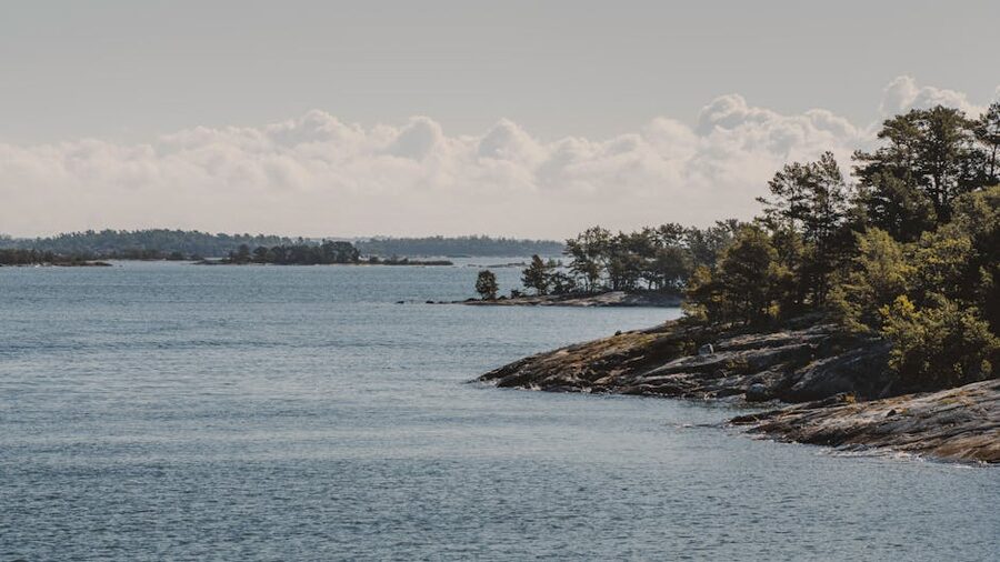 Boats in the Turku archipelago between forested islands