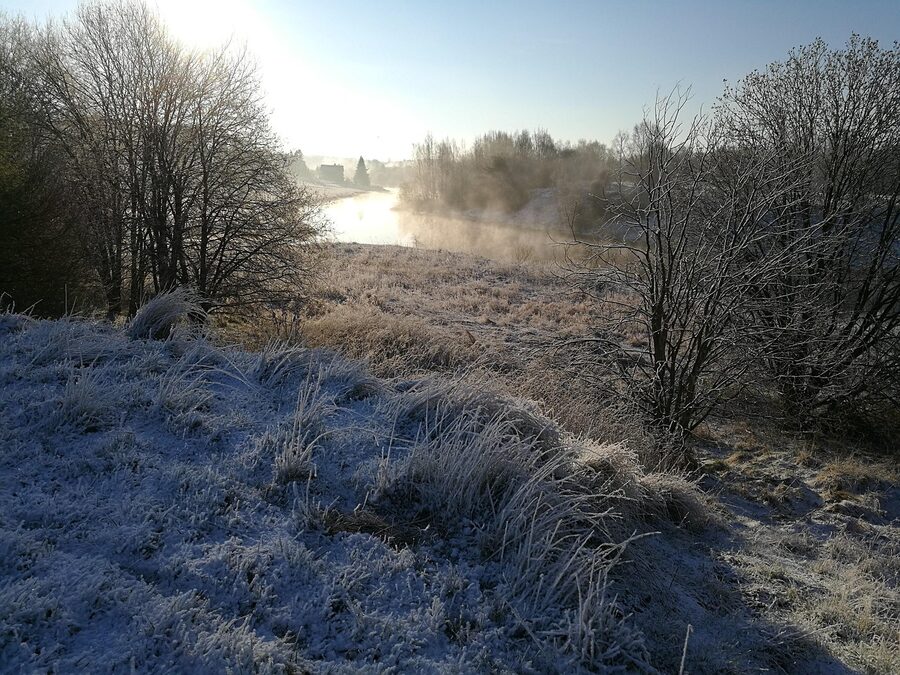 The Aurajoki river in spring with melting snow on the banks