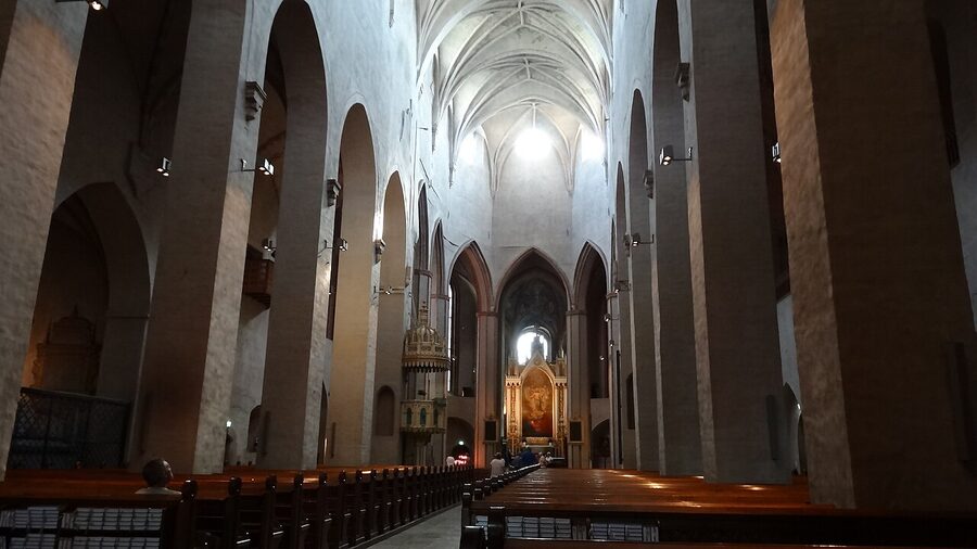 Interior of Turku Cathedral showing the whitewashed nave and high vaulted ceiling
