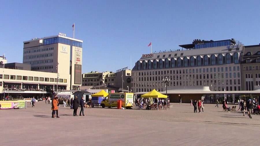 Turku Kauppatori, the city's main market square, with the surrounding shops and trams