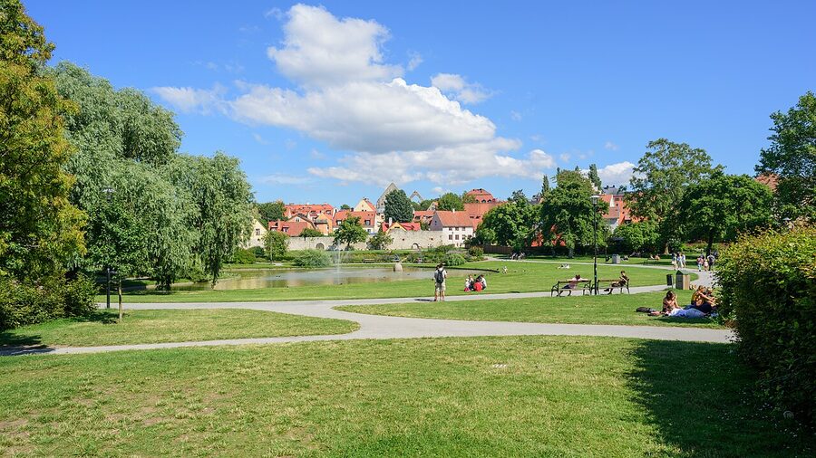 Almedalen park and harbour in Visby on a summer day