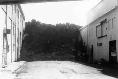 Lava flow advancing down a Heimaey street, 1973