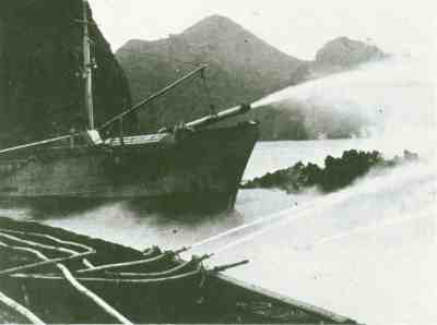 Ship pumping seawater onto the Heimaey lava margin